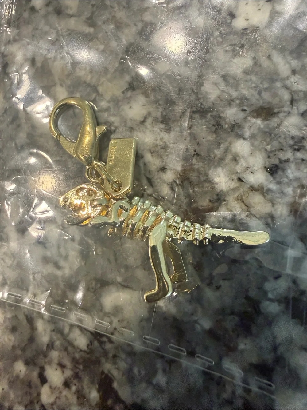 Gold-tone T-Rex 🦖 Dinosaur Charm Keyring